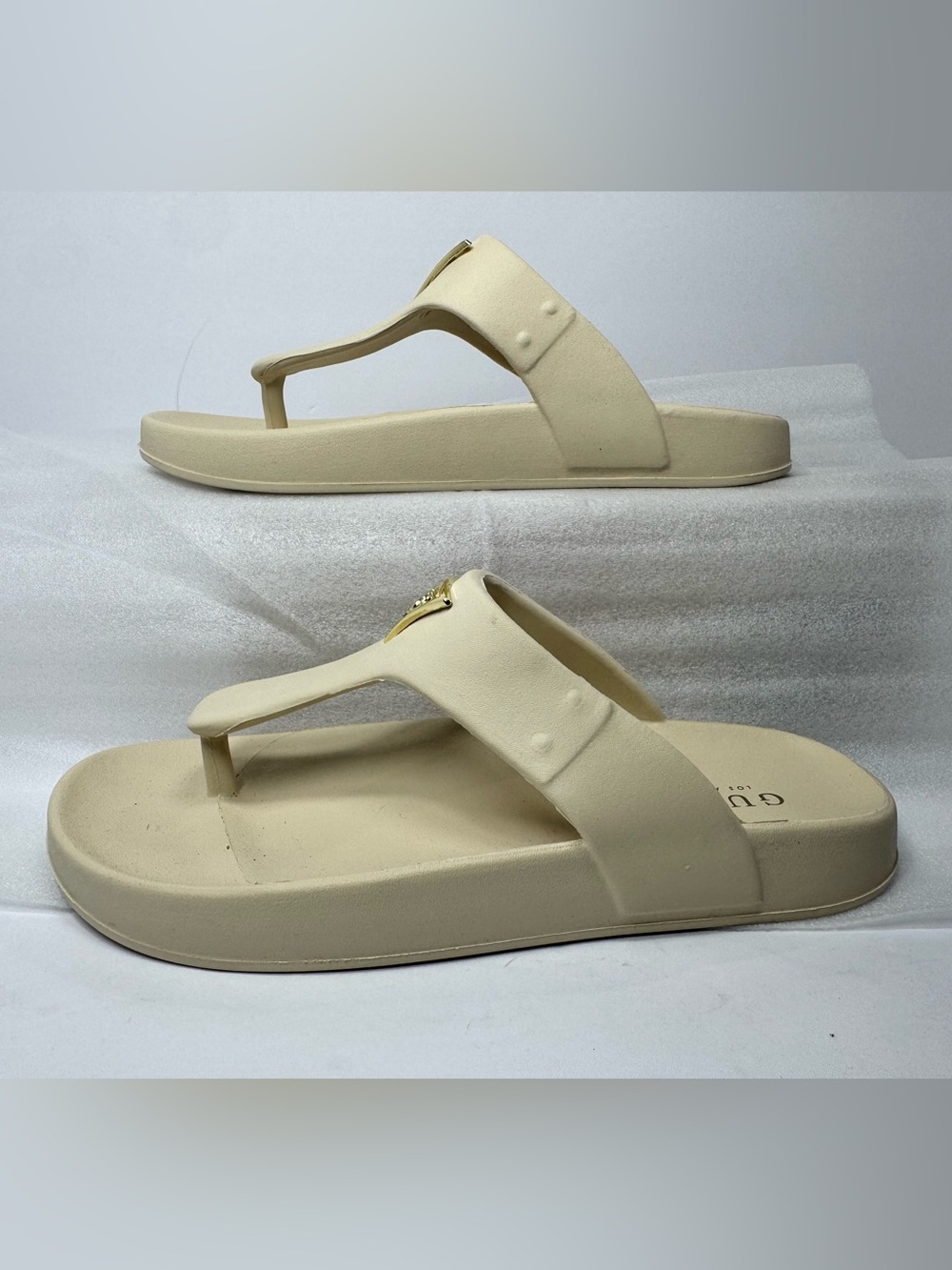 Guess Women’s size 6m Beige Thong Sandals with Gold Logo